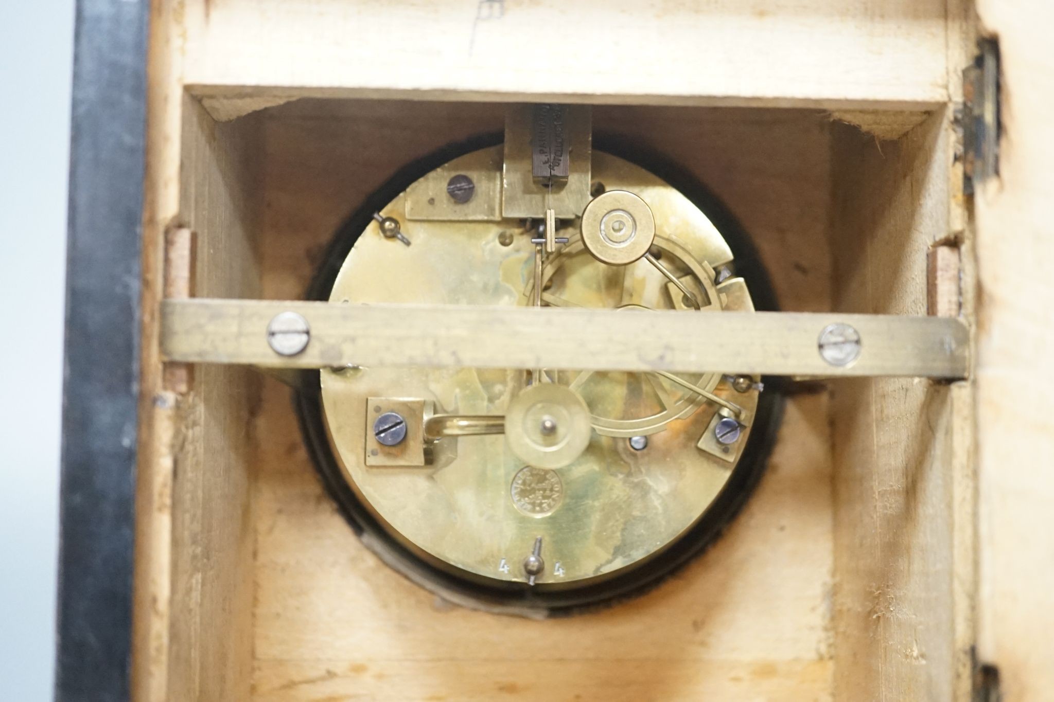 A Victorian walnut clock and an Art Deco walnut clock